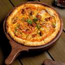 Wood-fired pizza being prepared at High Brew Bangalore