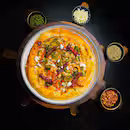 Wood-fired pizza being prepared at High Brew Bangalore