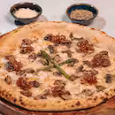 Wood-fired pizza being prepared at High Brew Bangalore