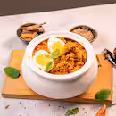 Authentic Thalappakatti biryani served at High Brew restaurant